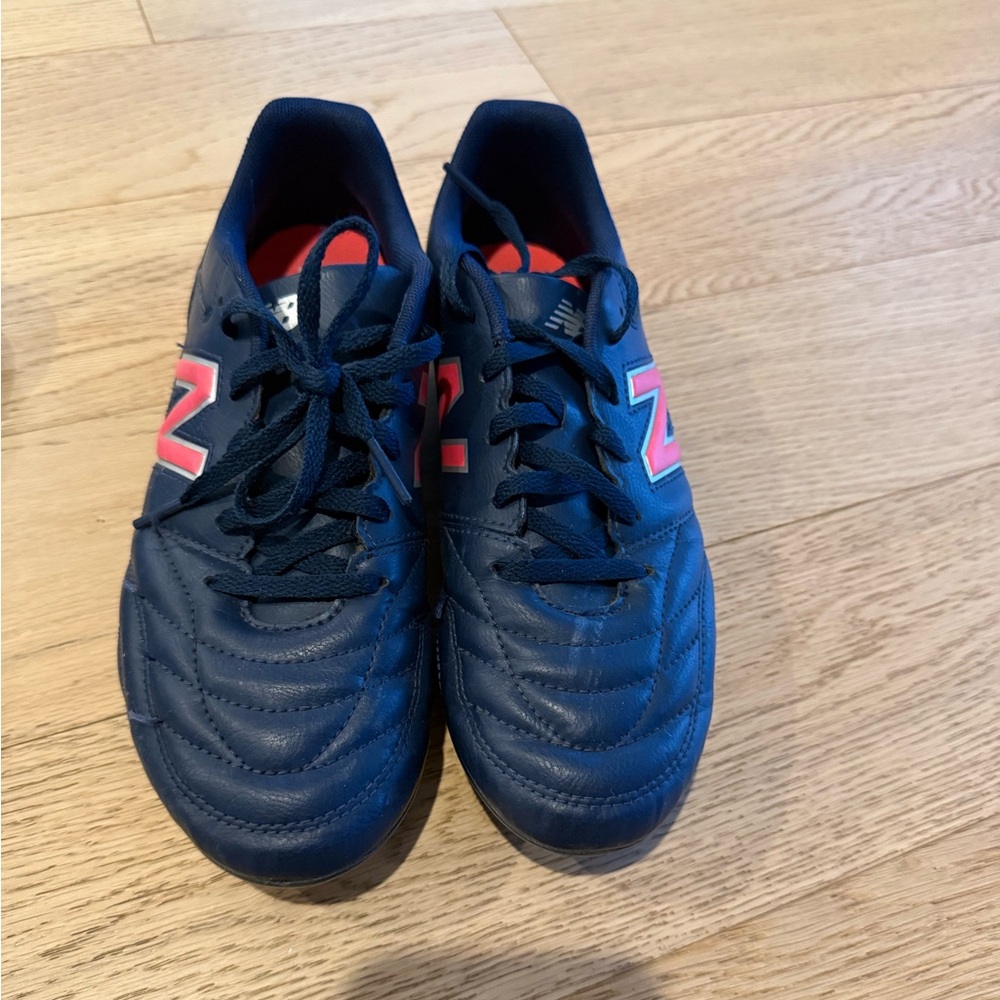 Kids New Balance soccer cleats ,navy and pink , size 6W